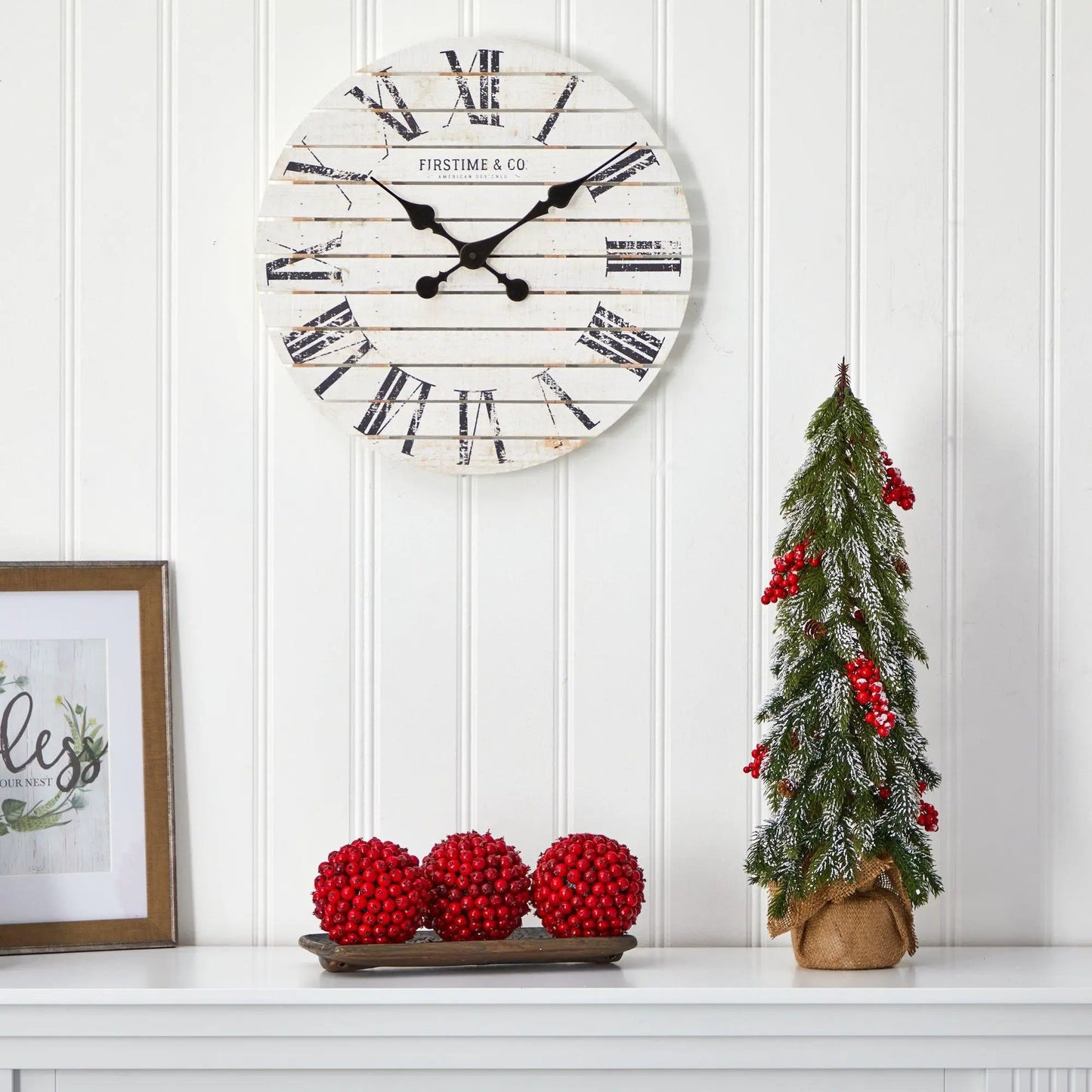 24 inch flocked Christmas tree with white snow-dusted branches and red berry accents on Tampa Home & Garden Store