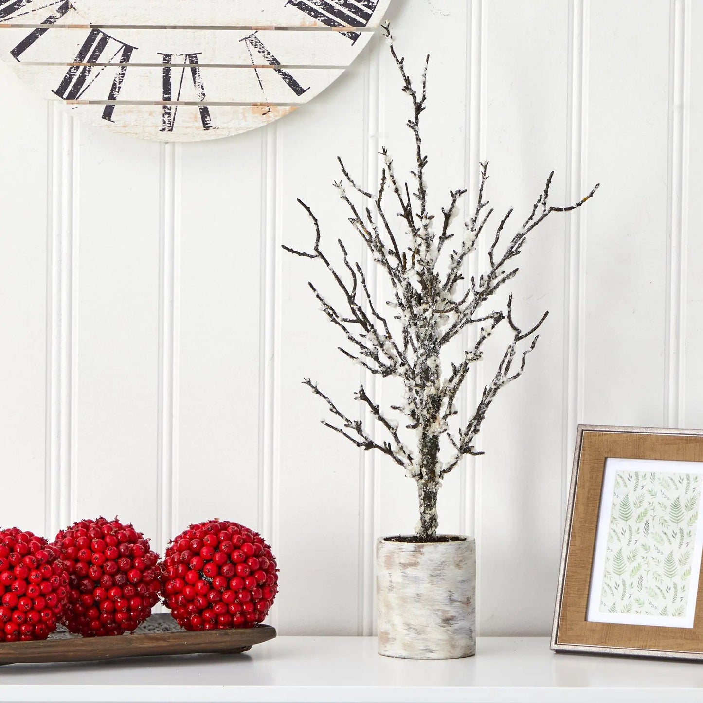 Snowed Twig Artificial Christmas Tree in Planter with snowy branches and two red berry clusters on Tampa Home & Garden Store