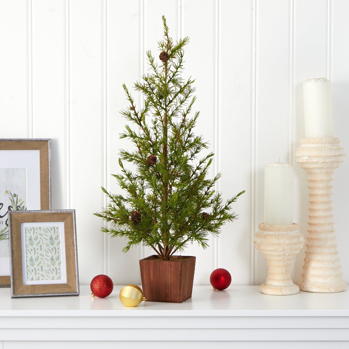Alpine 28in artificial Christmas tree by Nearly Natural in wood planter with pinecones on Tampa Home & Garden Store