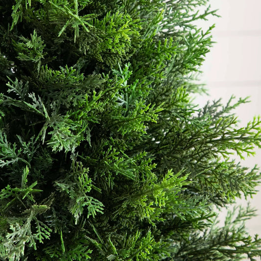 Artificial Cedar Tree with dense green foliage close-up on Tampa Home & Garden Store