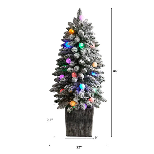 3 ft flocked Highland Fir tree with 127 branches and ornaments in decorative planter on Tampa Home & Garden Store