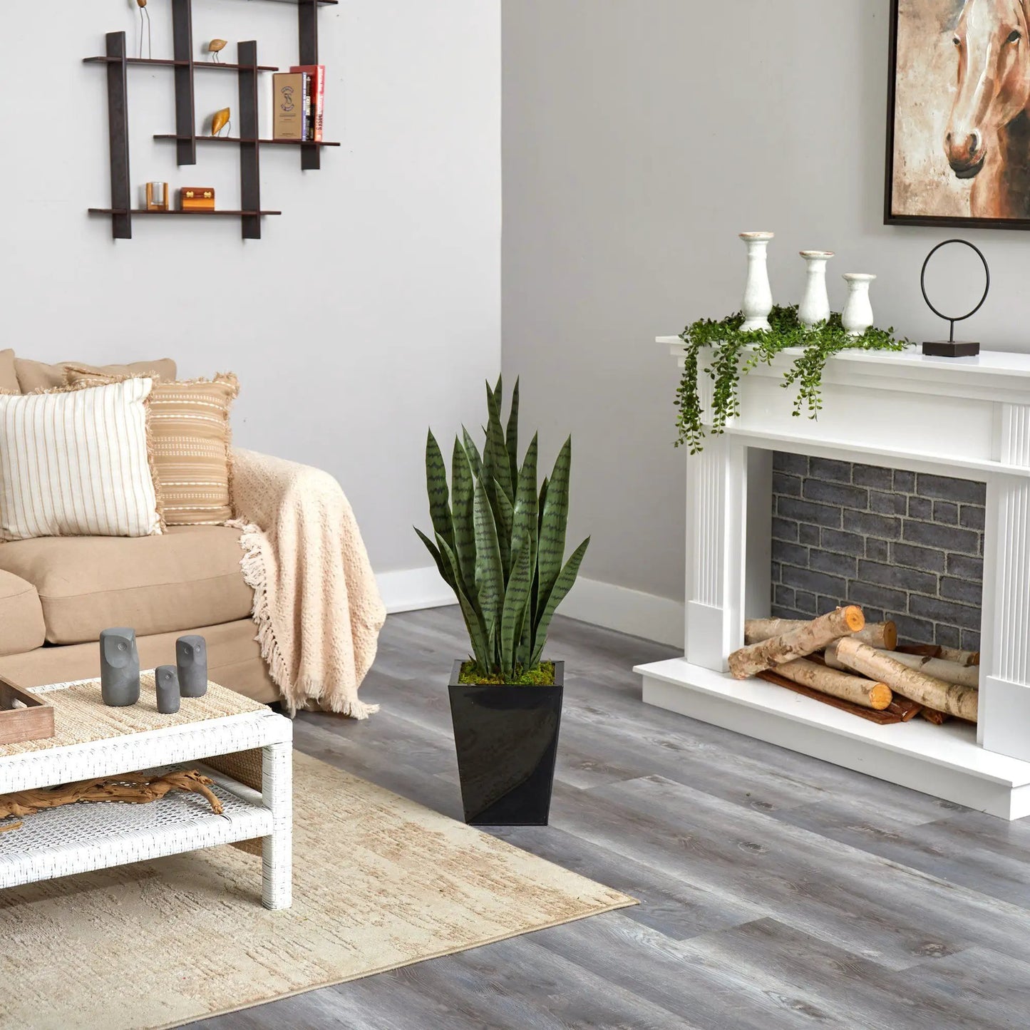 40-Inch artificial Sansevieria plant in a black metal planter with tall variegated green leaves on Tampa Home & Garden Store