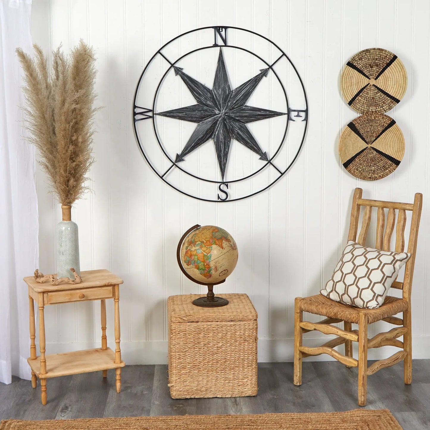 40 Inch Washed Nautical Metal Compass Wall Art with distressed black star and circular frame on Tampa Home & Garden Store
