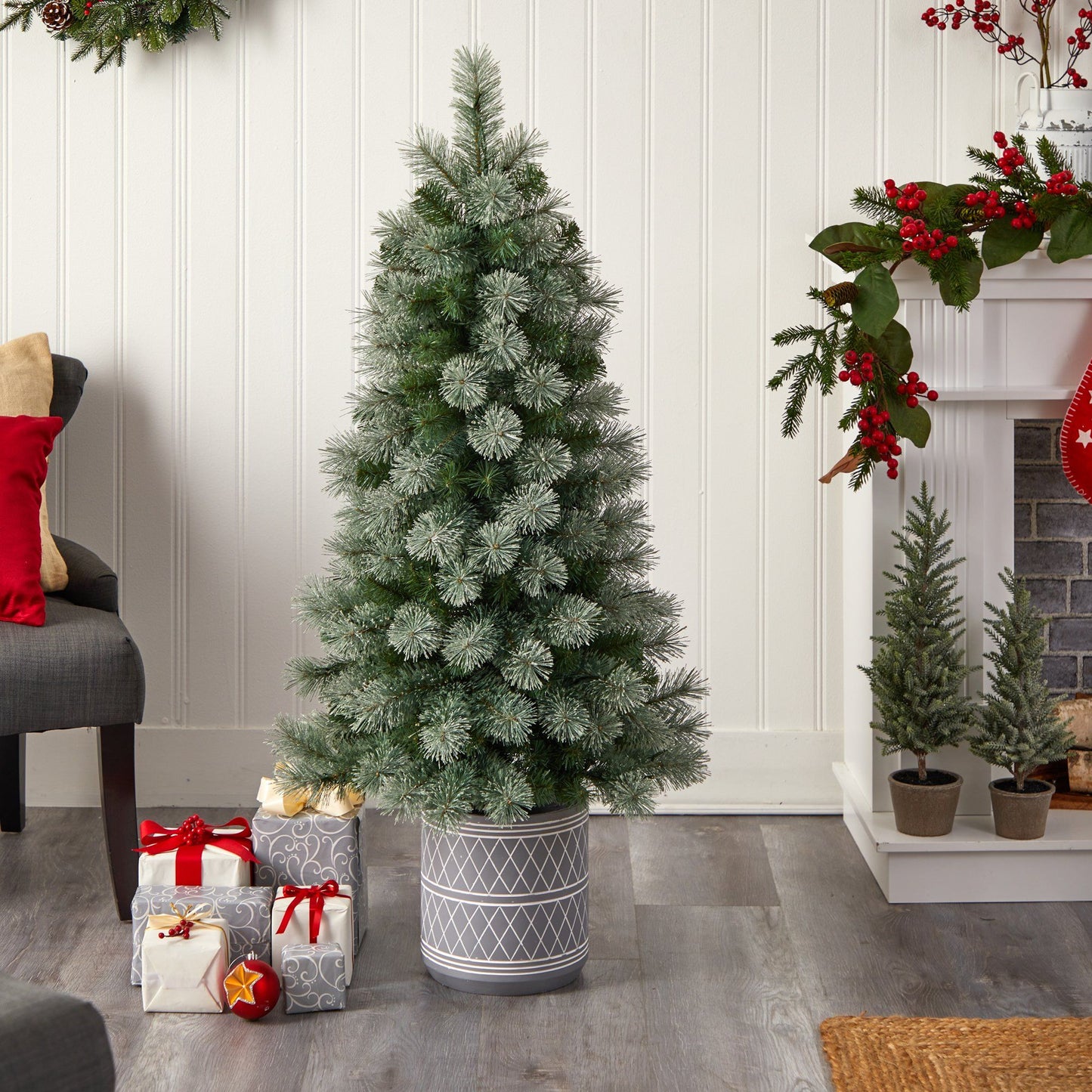 Nova Scotia artificial Christmas Tree with frosted needles in a stone planter on Tampa Home & Garden Store