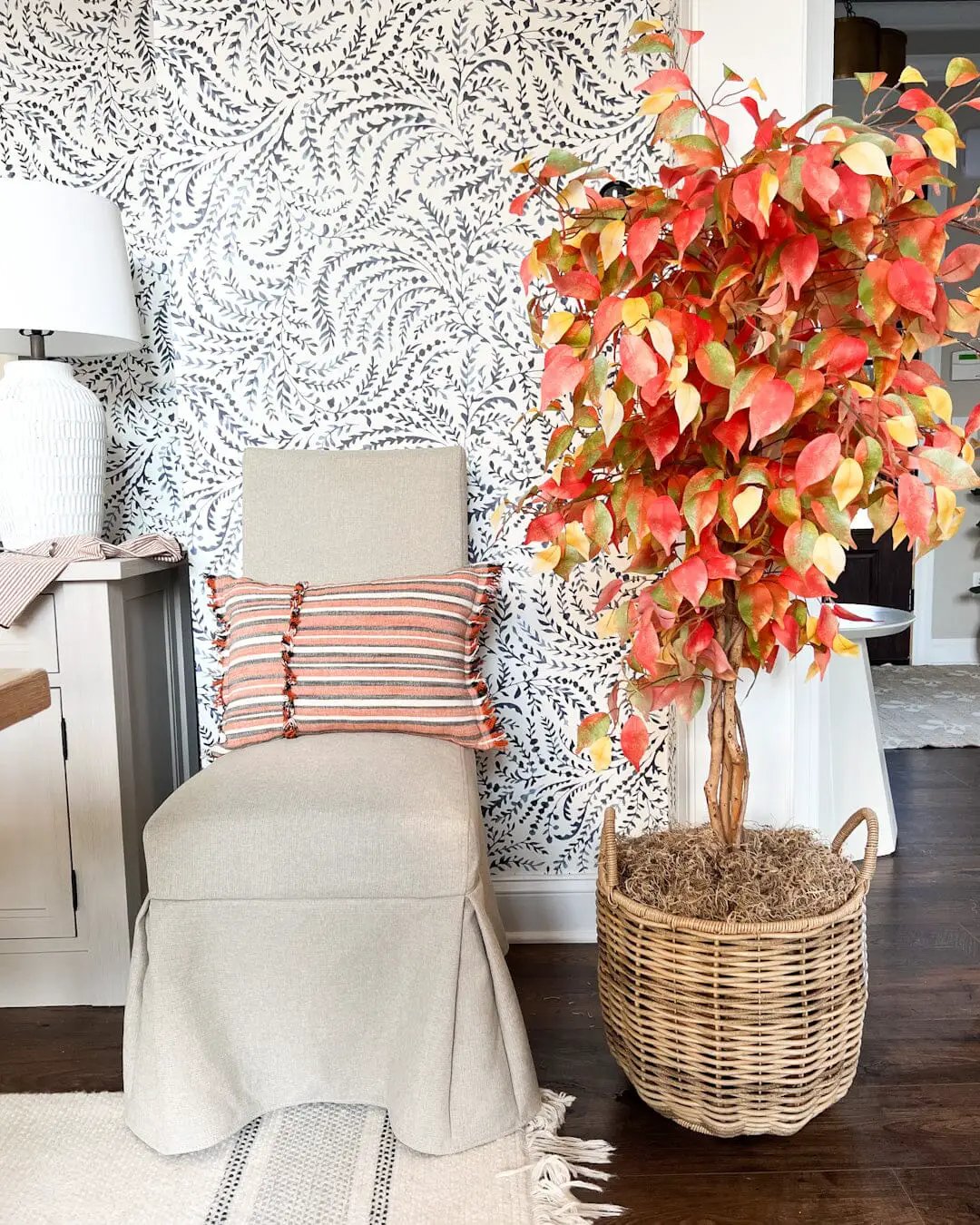 Autumn Ficus artificial tree with smoky leaves, orange-red and yellow foliage in a woven wicker basket on Tampa Home & Garden Store