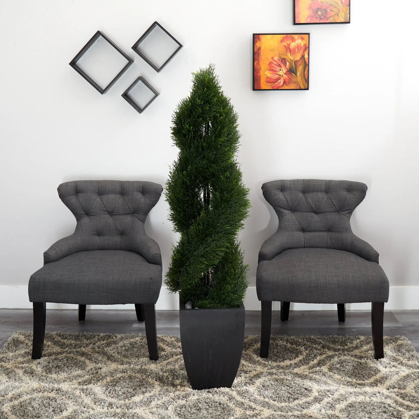 5 ft Nearly Natural double Cypress Spiral Topiary in black planter between two gray chairs on Tampa Home & Garden Store