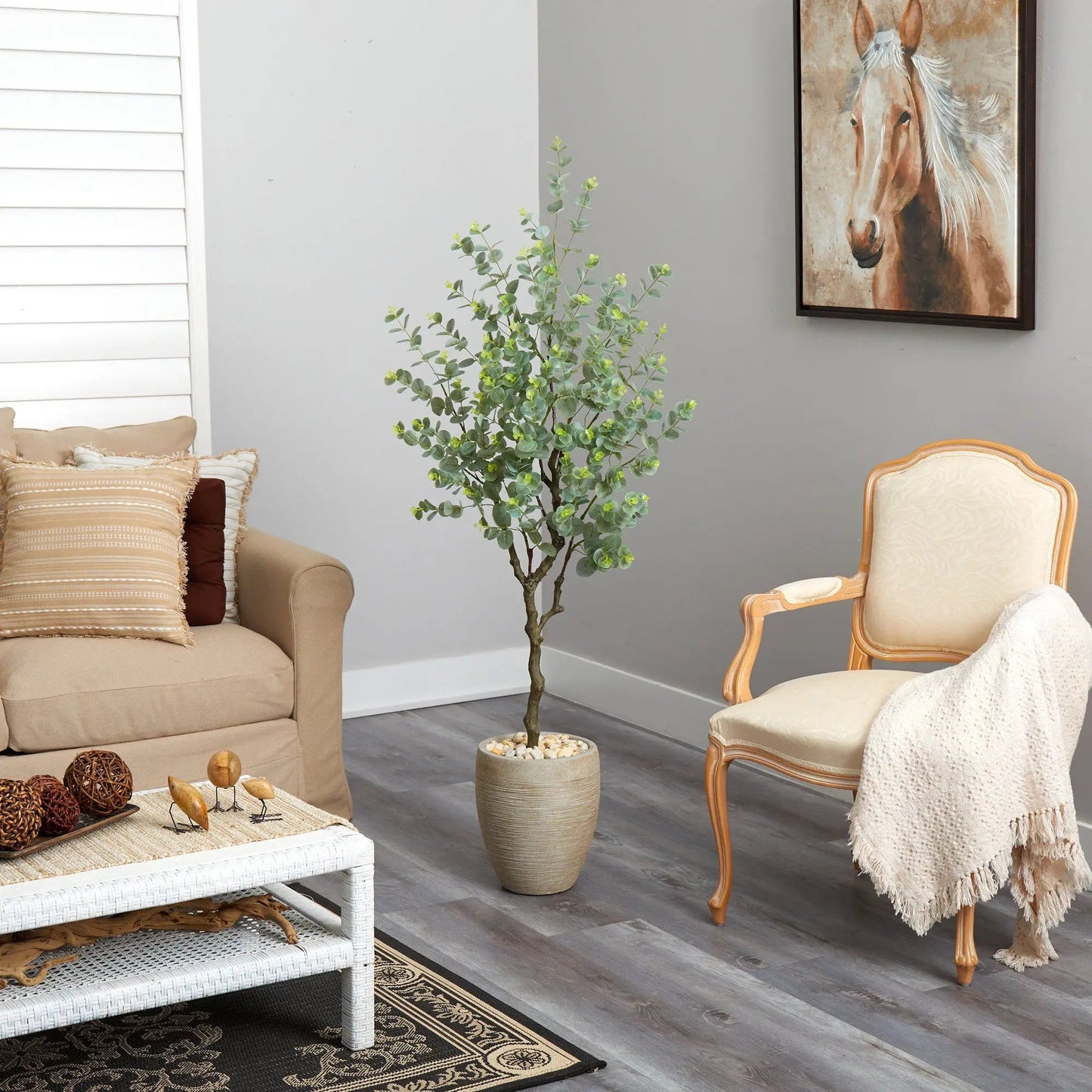 Eucalyptus artificial tree in sandstone planter with green leaves in living room on Tampa Home & Garden Store