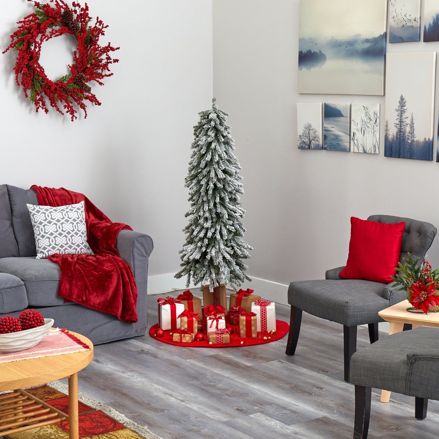 5 ft flocked alpine Christmas tree with 200 lights, snowy white branches on wooden stand on Tampa Home & Garden Store
