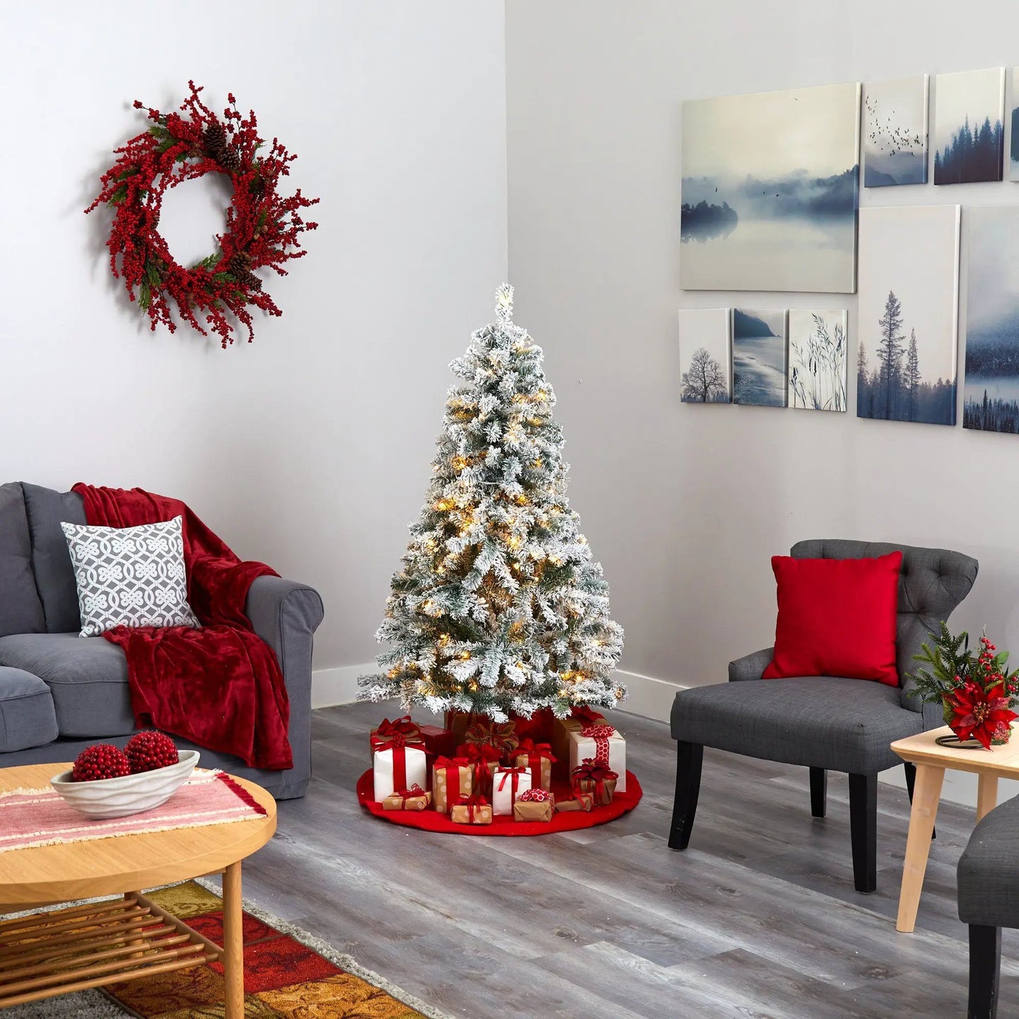 5 ft Flocked Spruce Christmas Tree with LED lights, snowy branches in a cozy living room on Tampa Home & Garden Store