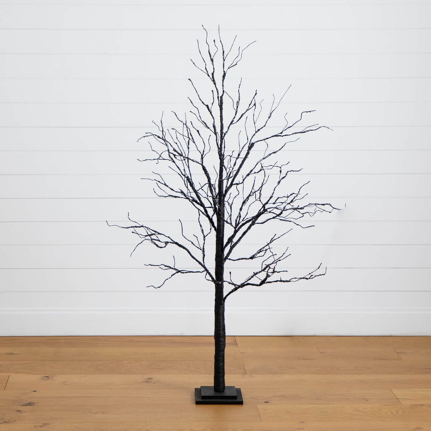 5 ft Nearly Natural pre-lit Halloween Black Twig Artificial Tree with orange and purple LEDs on black stand on Tampa Home & Garden Store