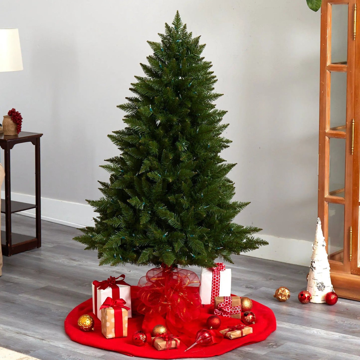 5 ft Vermont Spruce artificial Christmas tree Nearly Natural green needles with presents at base on Tampa Home & Garden Store