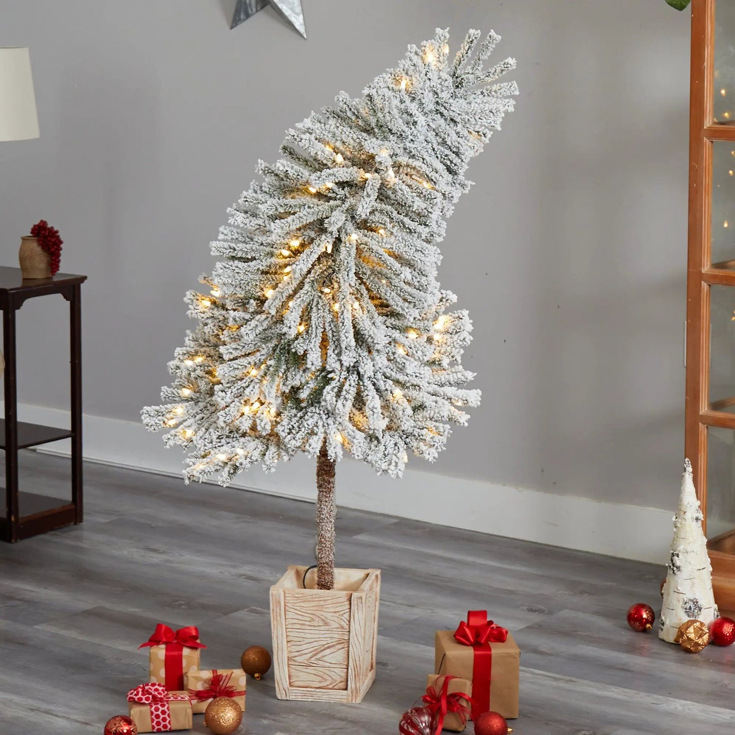 Winter Flocked Leaning Christmas Tree Prelit by Nearly Natural, 5ft tree with warm white lights on Tampa Home & Garden Store