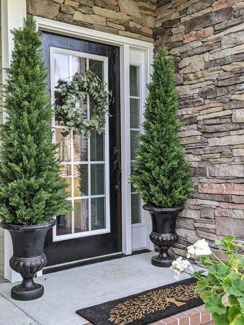Two Cypress Cone Topiary artificial trees UV resistant indoor/outdoor in black urn planters on Tampa Home & Garden Store