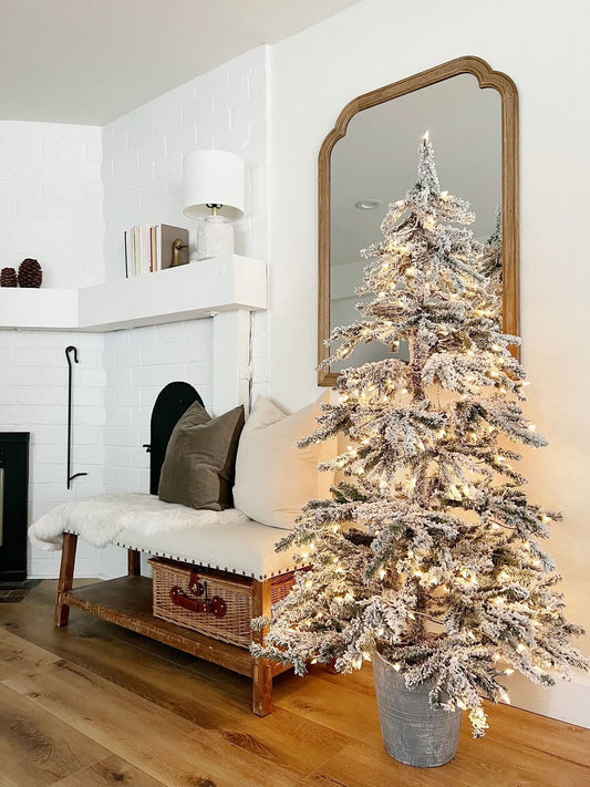 6 ft flocked pine tree with 250 LEDs in a gray metal planter, indoor Nearly Natural display on Tampa Home & Garden Store