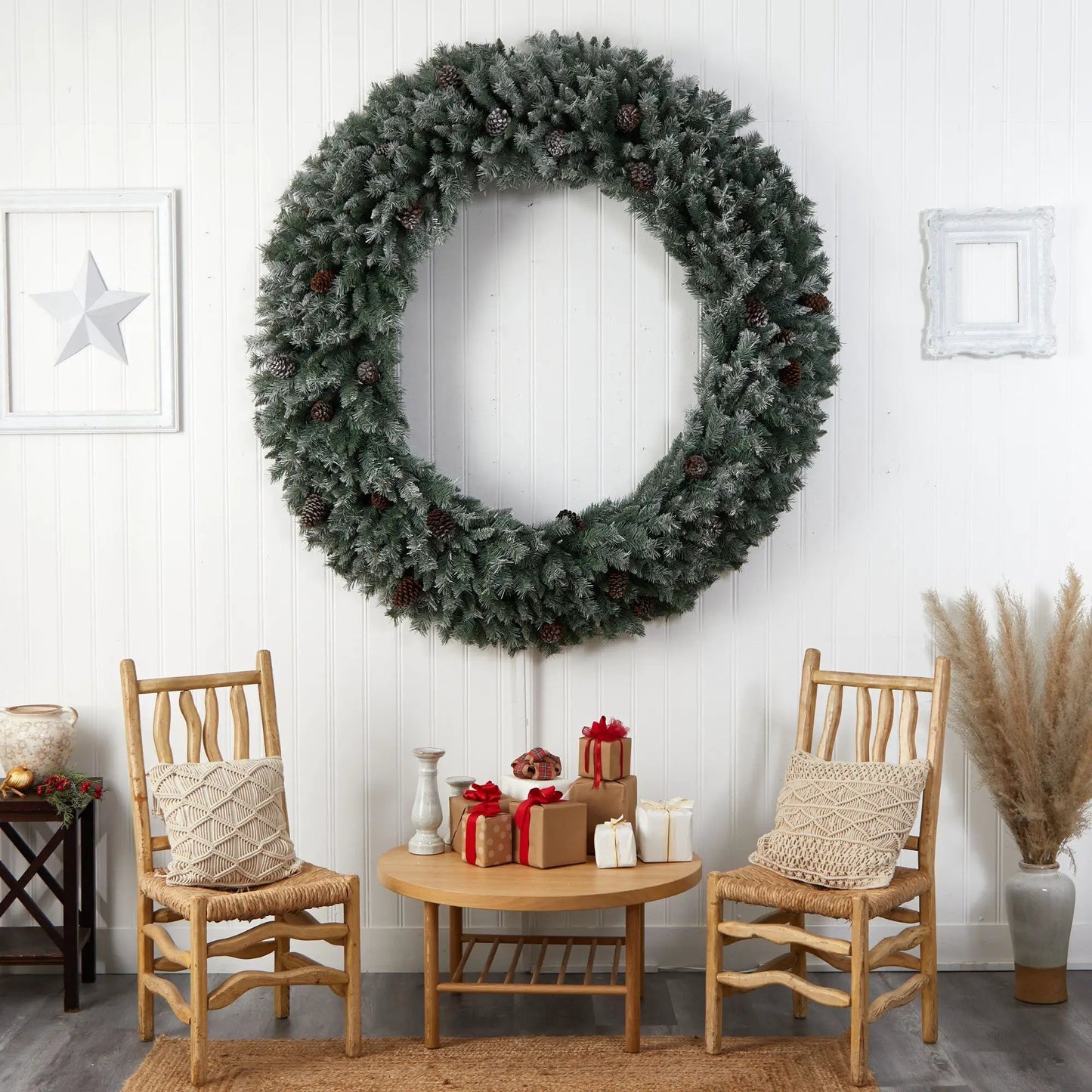 Giant flocked Christmas wreath with pinecones and frosted needles for holiday decor on Tampa Home & Garden Store