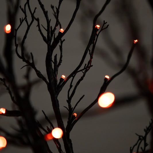 Six Ft Pre-Lit Twig Tree with Orange Purple LEDs on dark twig branches on Tampa Home & Garden Store