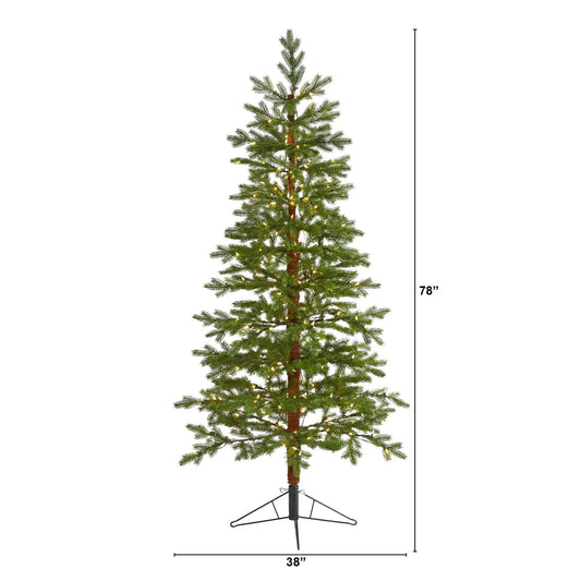 Fairbanks Fir artificial Christmas tree with warm LED lights on metal stand on Tampa Home & Garden Store