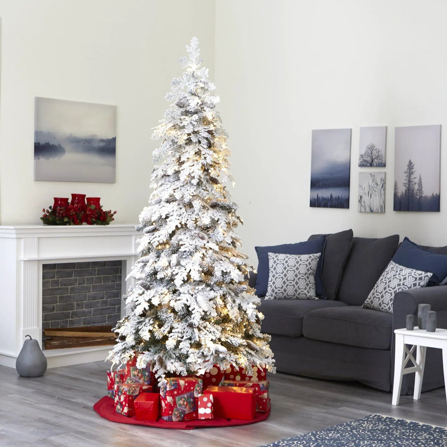 7 ft flocked down-swept spruce artificial Christmas tree with pinecones in a cozy living room on Tampa Home & Garden Store