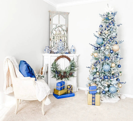 7ft Slim Flocked Montreal Fir Christmas Tree with blue and gold ornaments and ribbon on Tampa Home & Garden Store