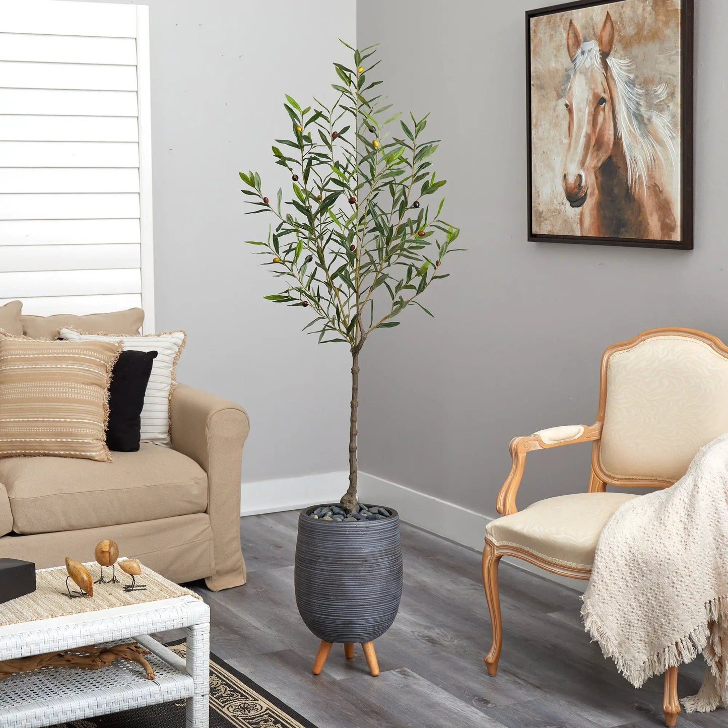 Nearly Natural olive artificial tree in gray planter on a wooden stand in living room on Tampa Home & Garden Store