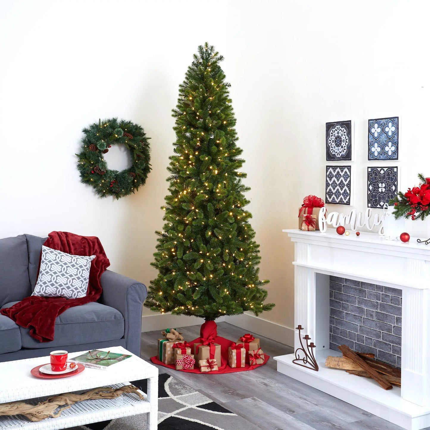 Slim Virginia Spruce Pencil Christmas Tree green with warm lights in living room Nearly Natural on Tampa Home & Garden Store