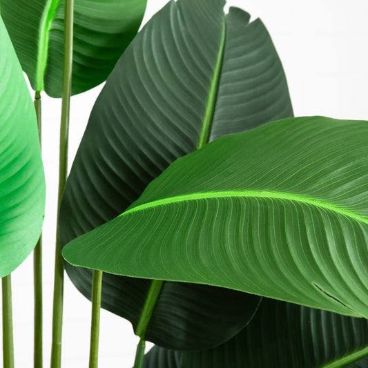 Traveler's Palm artificial tree close-up of vibrant green leaves for indoor decor on Tampa Home & Garden Store
