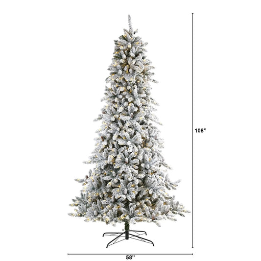 Nearly Natural 9 ft flocked Livingston Fir tree with pine cones on a black metal stand on Tampa Home & Garden Store