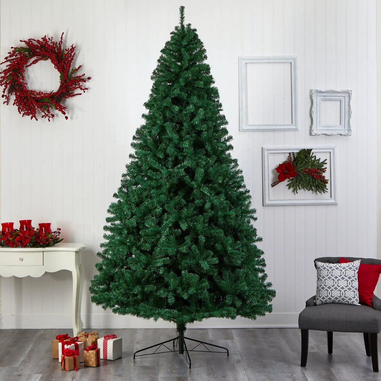 9 ft Northern Tip Christmas Tree by Nearly Natural with green branches on a metal stand on Tampa Home & Garden Store