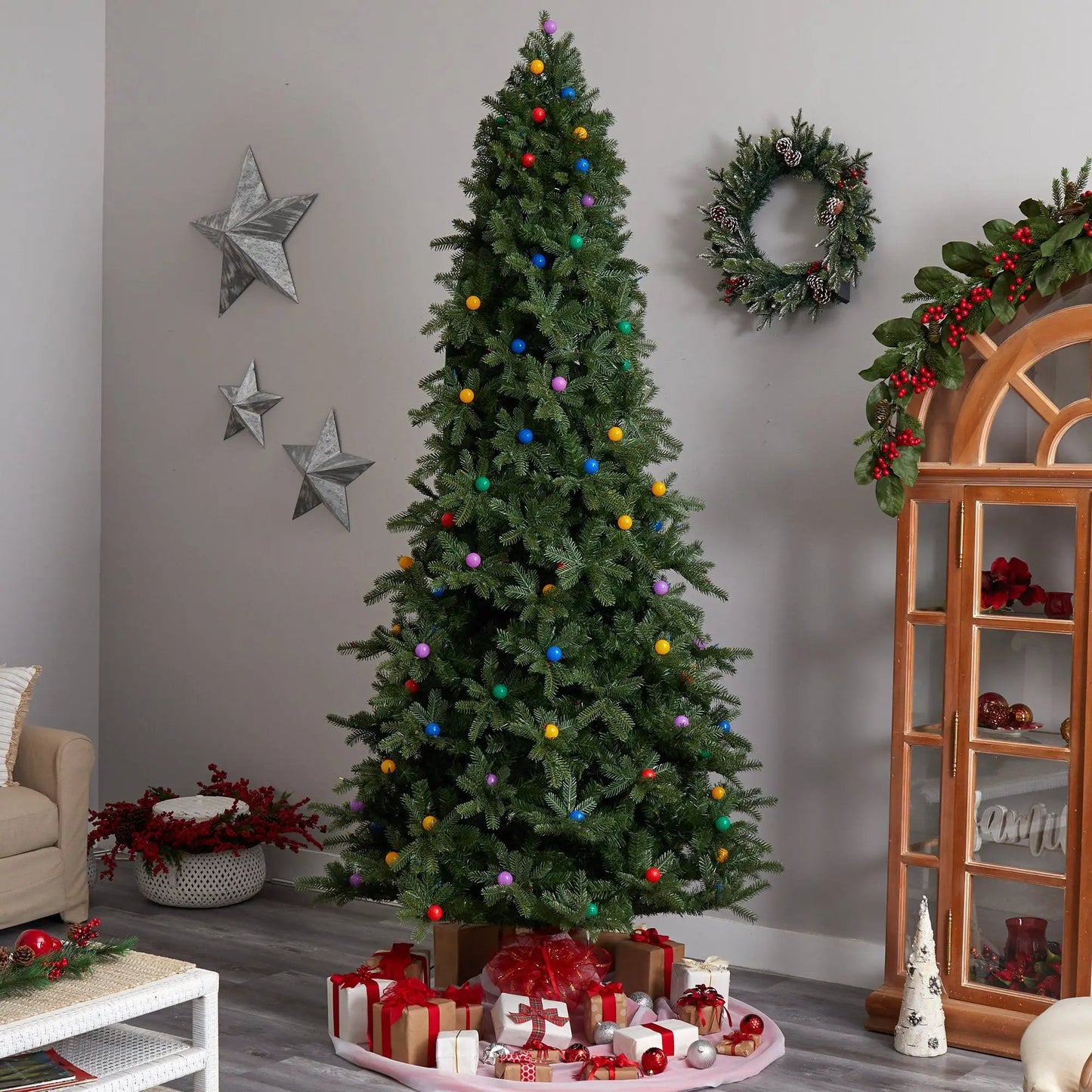 9.5 ft Montana Mountain Fir artificial Christmas tree with multicolor ornaments on Tampa Home & Garden Store