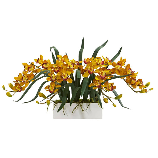 Artificial cymbidium orchid arrangement with yellow blooms and green leaves in a white vase on Tampa Home & Garden Store
