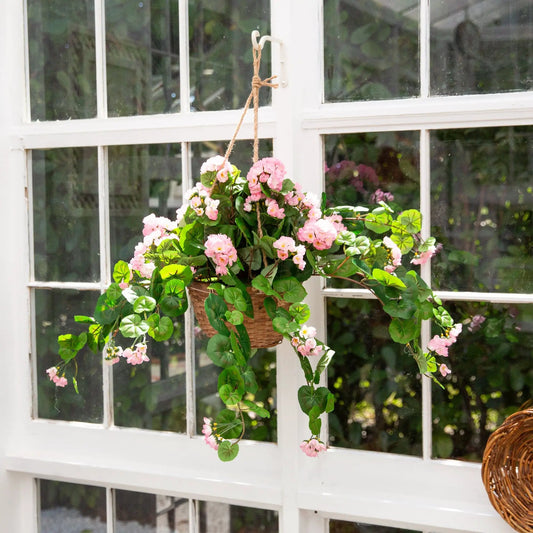 Geranium Hanging Basket Silk Plant Decor with pink silk blooms and green leaves in a basket on Tampa Home & Garden Store