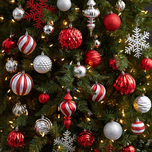 Holiday Deluxe Shatterproof 81-Count Ornament Set in red, silver, white on a Christmas tree on Tampa Home & Garden Store