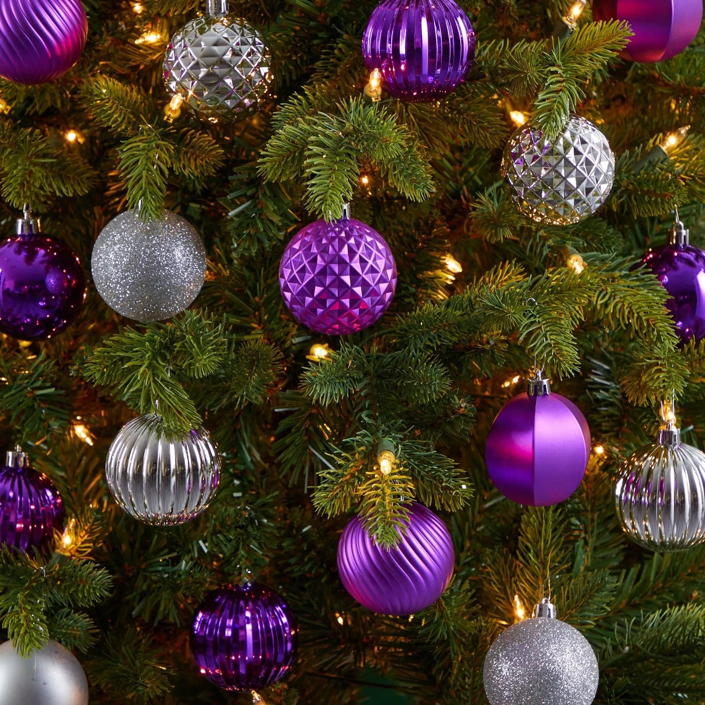 Holiday Shatterproof Ornament 101-Count 60mm Tube set in purple and silver on tree on Tampa Home & Garden Store