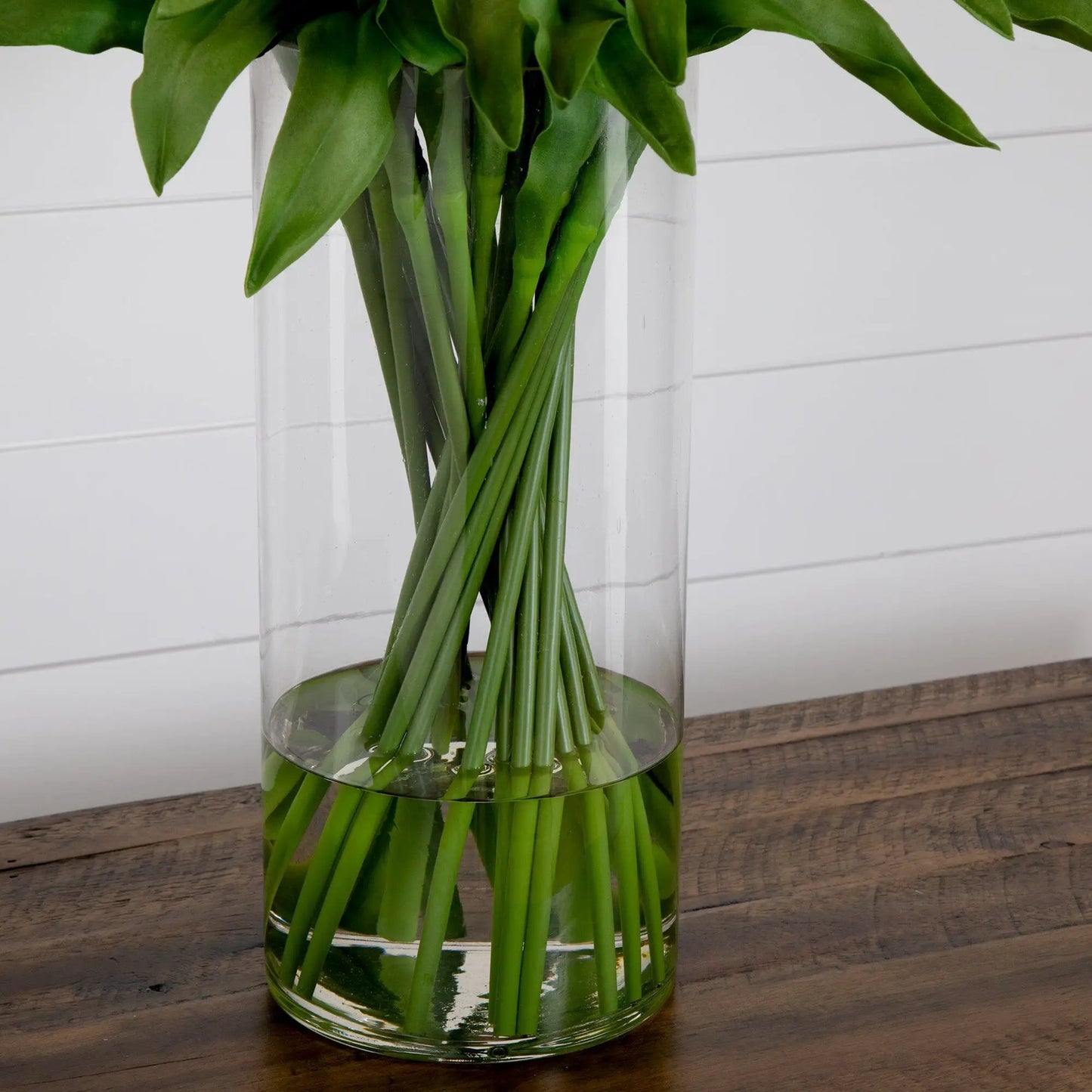 Signature Collection Giant Tulip Arrangement artificial stems in a glass vase with green leaves on Tampa Home & Garden Store