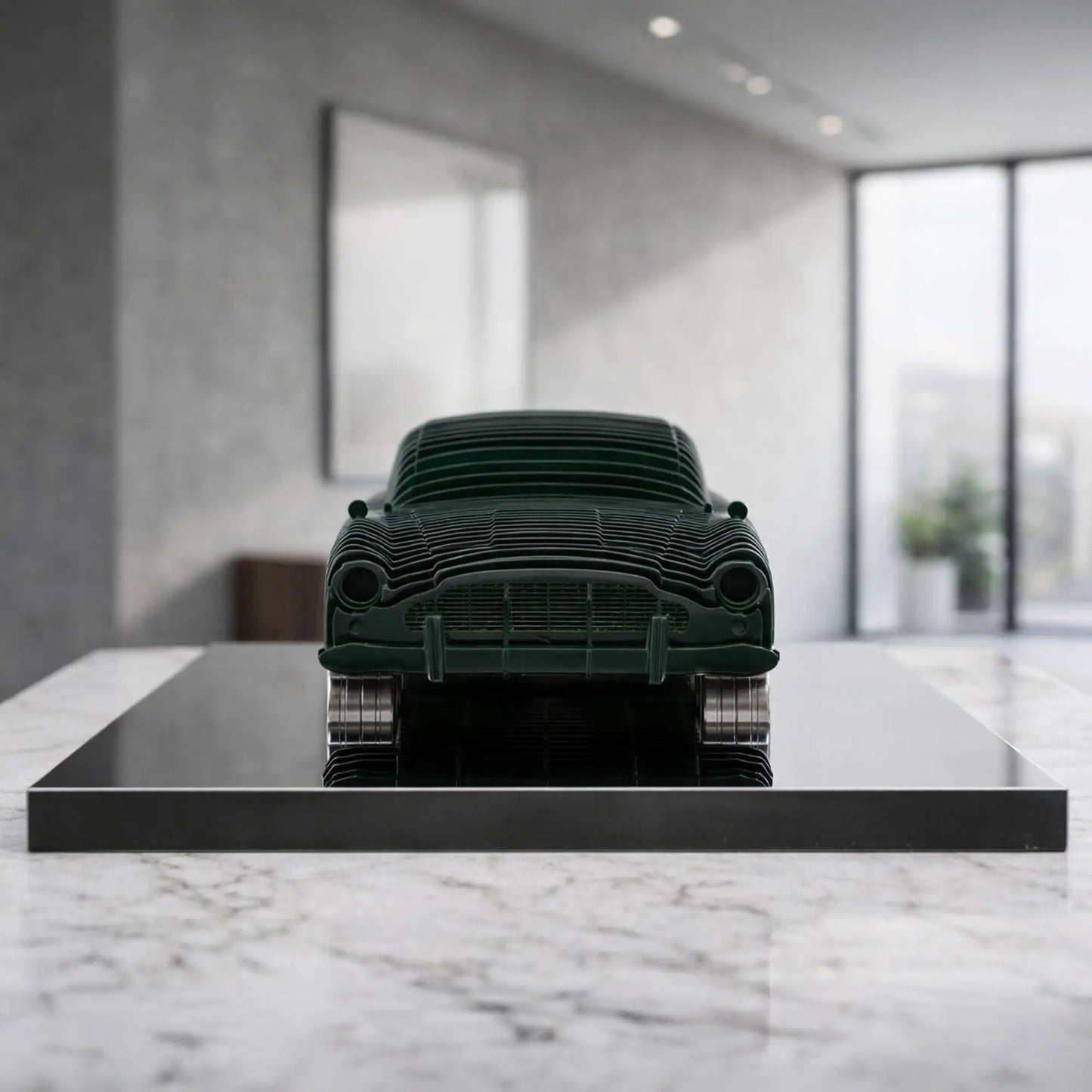 Db5 metal car sculpture with aluminum wheels in dark green finish on Tampa Home & Garden Store