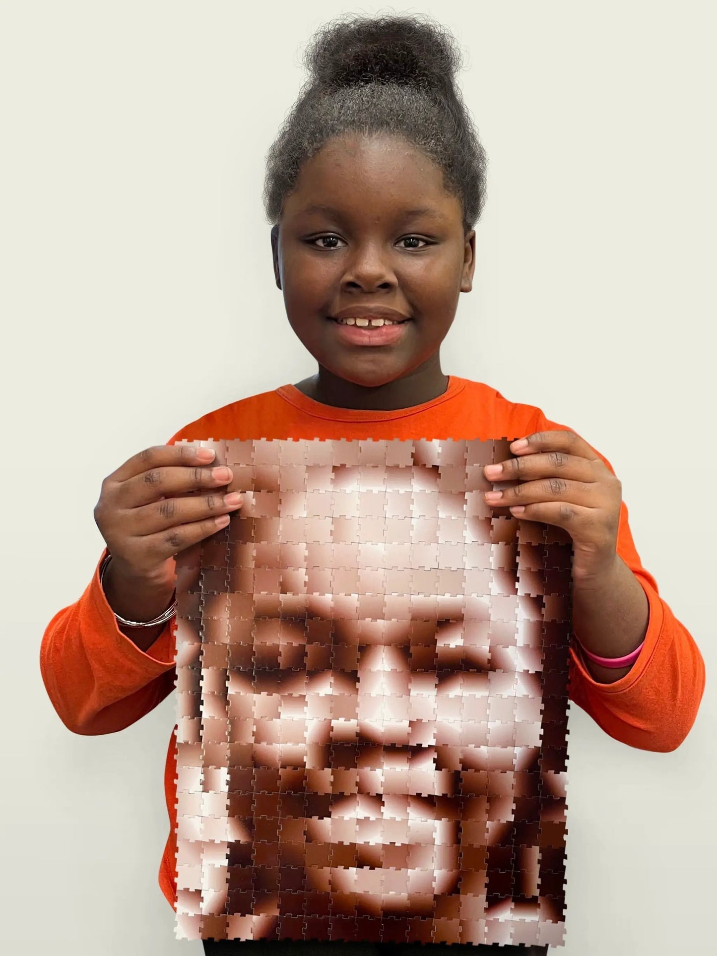 Puzzle Face 300 Piece Puzzle copper-toned metallic pieces on Tampa Home & Garden Store
