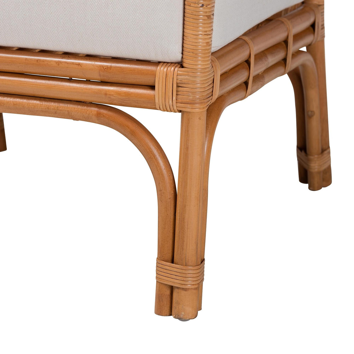 Honey rattan accent chair with beige cushion and natural woven frame on Tampa Home & Garden Store