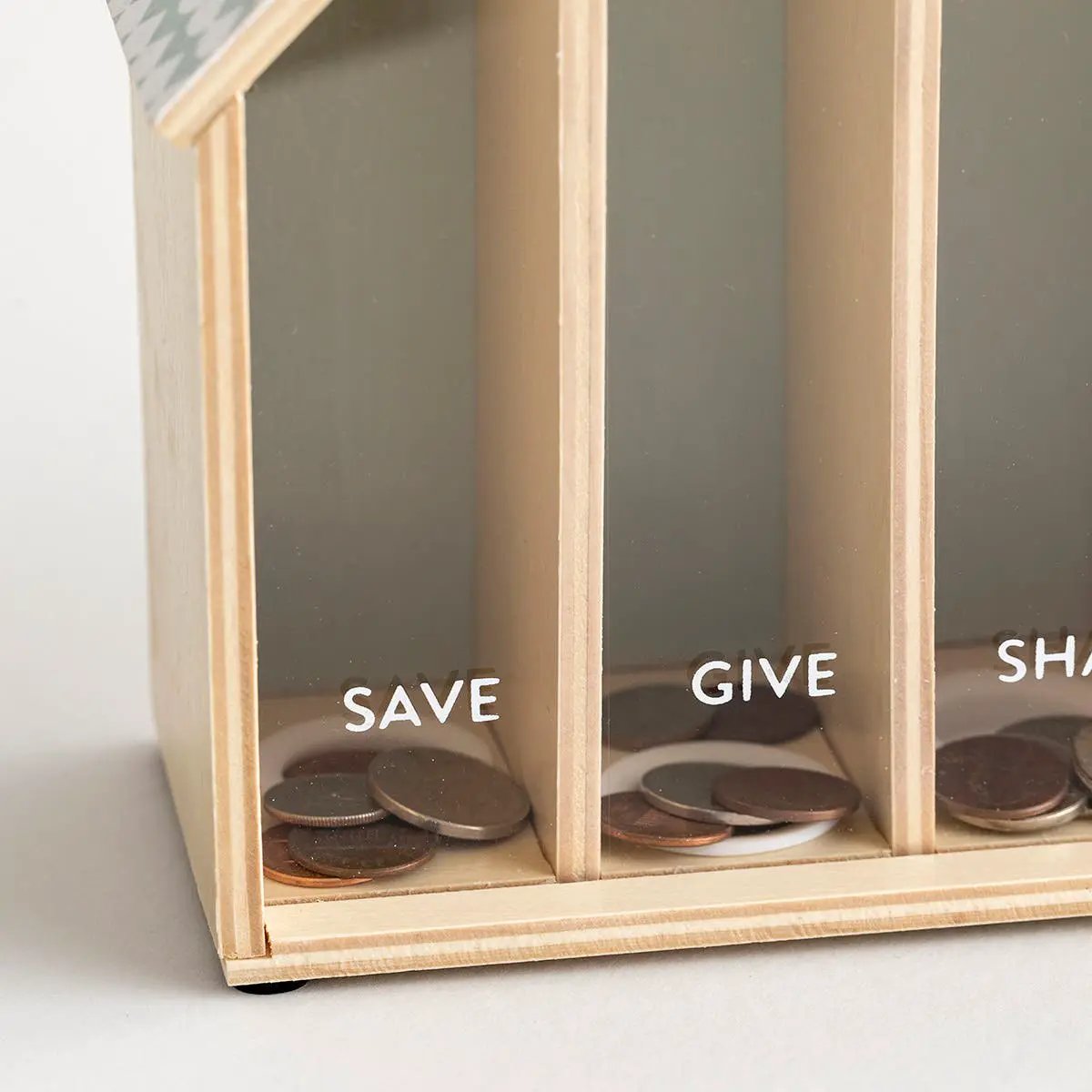 My First Bank for Kids wooden three-compartment savings bank labeled Save, Give, Share with coins inside on Tampa Home & Garden Store
