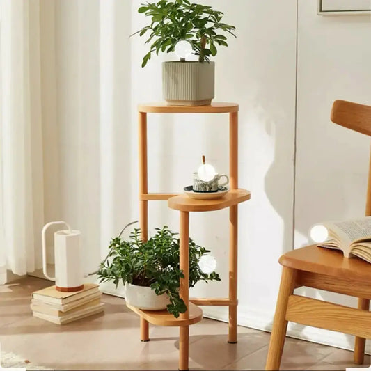Natural Bamboo Corner Plant Stand 3-Tier Decorbites with potted greenery in a sunlit living room on Tampa Home & Garden Store