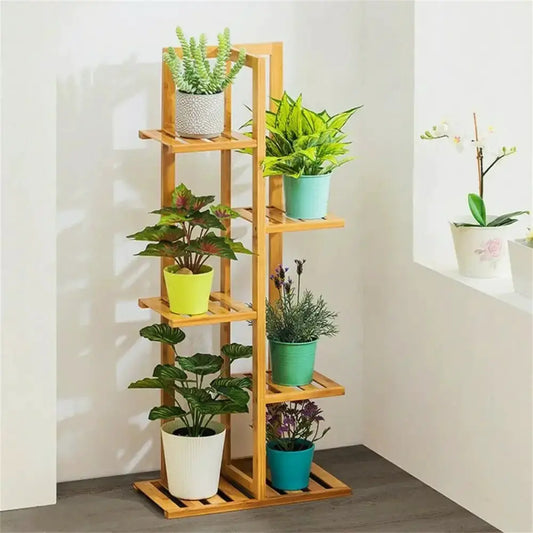 Modern bamboo plant stand with 5–6 tier shelves, natural wood frame, colorful potted plants on Tampa Home & Garden Store