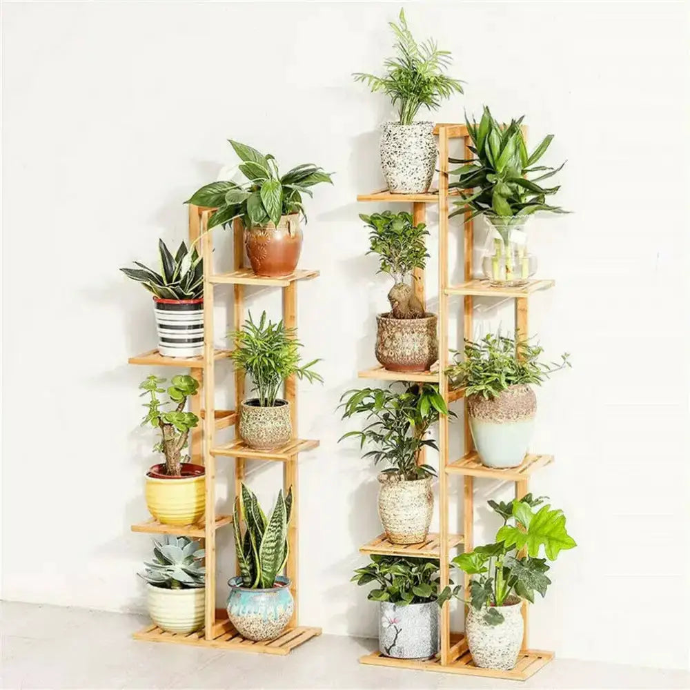 Decorbites bamboo plant stand with 5-6 tier shelves loaded with assorted potted plants on Tampa Home & Garden Store