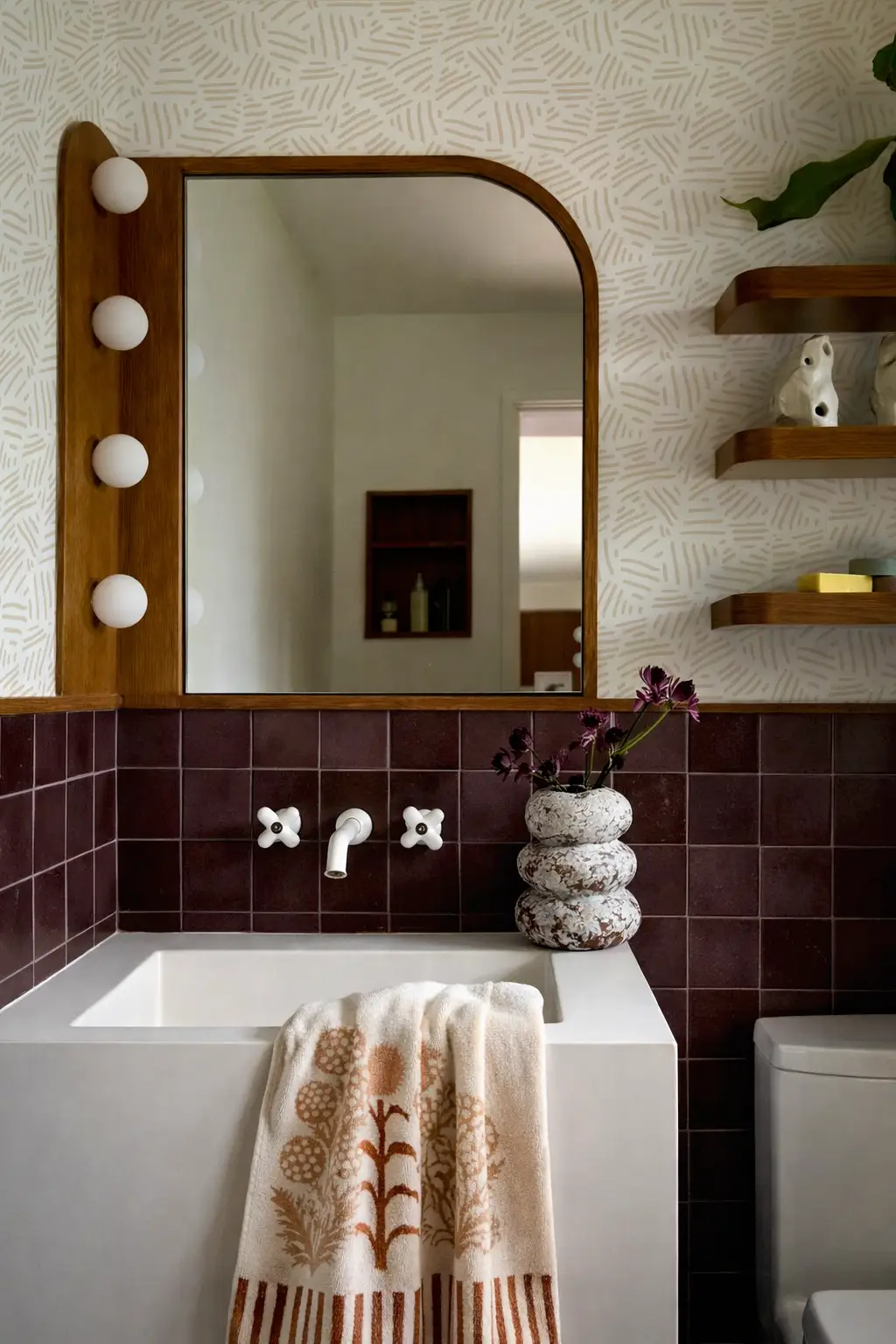 Simple Stripes Wallpaper White and Tan striped pattern on a bathroom wall with a wooden mirror on Tampa Home & Garden Store