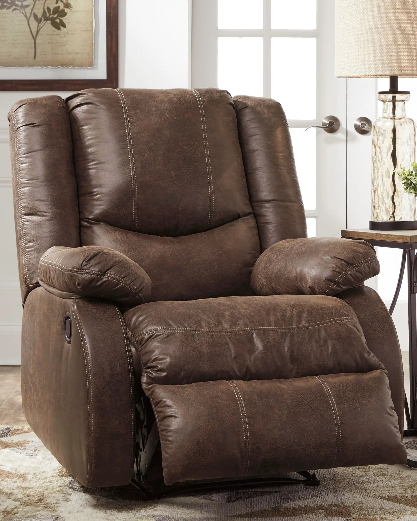 Bladewood recliner in brown leather with contrast stitching and plush padded arms on Tampa Home & Garden Store