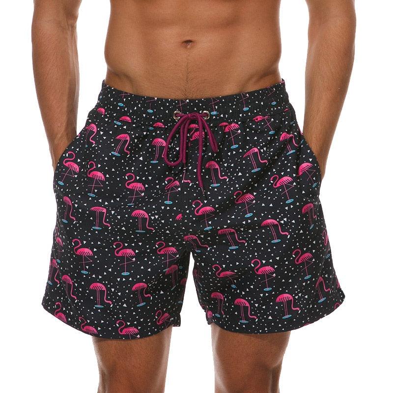 Men's boardshorts flamingo print quick-dry swim trunks with pink drawstring mesh lining on Tampa Home & Garden Store