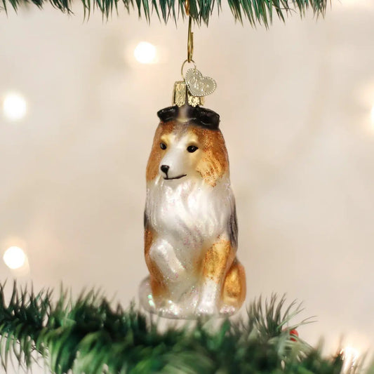 Old World Christmas Sheltie glass dog ornament with brown and white fur and glitter accents on Tampa Home & Garden Store