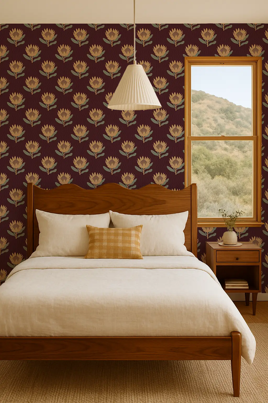 King Protea Wallpaper in dark plum and butter yellow floral pattern on a bedroom wall on Tampa Home & Garden Store