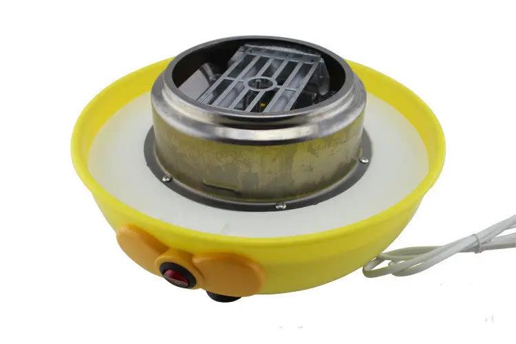 Mini minimalist cotton candy machine with bright yellow base and stainless steel head on Tampa Home & Garden Store