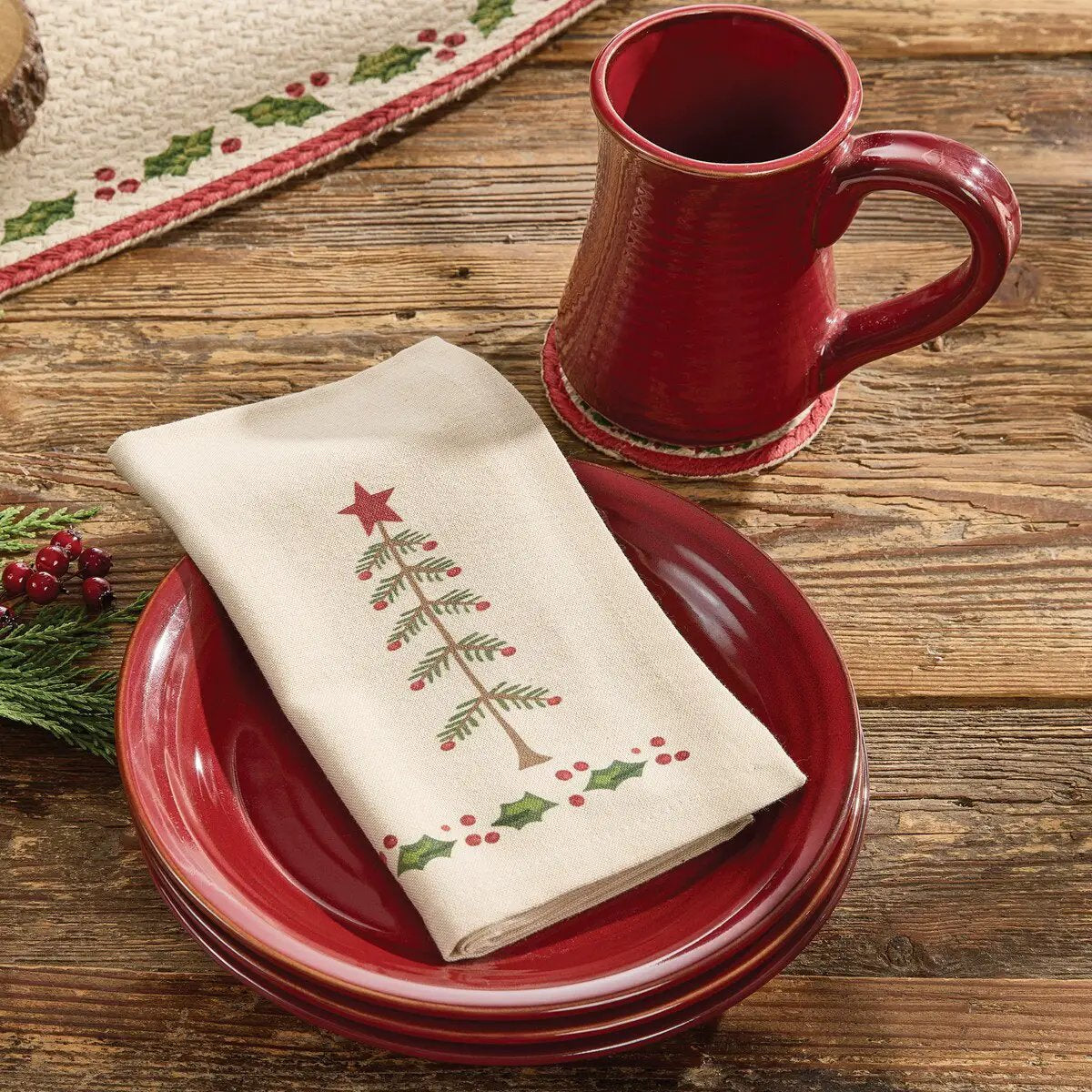 Feather Tree Printed Napkin beige cloth with Christmas tree motif on rustic wood table on Tampa Home & Garden Store