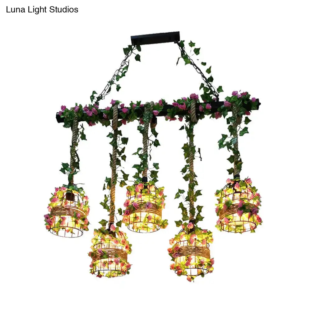 Black industrial chandelier by Decorbites with five floral wire basket pendants on vines on Tampa Home & Garden Store