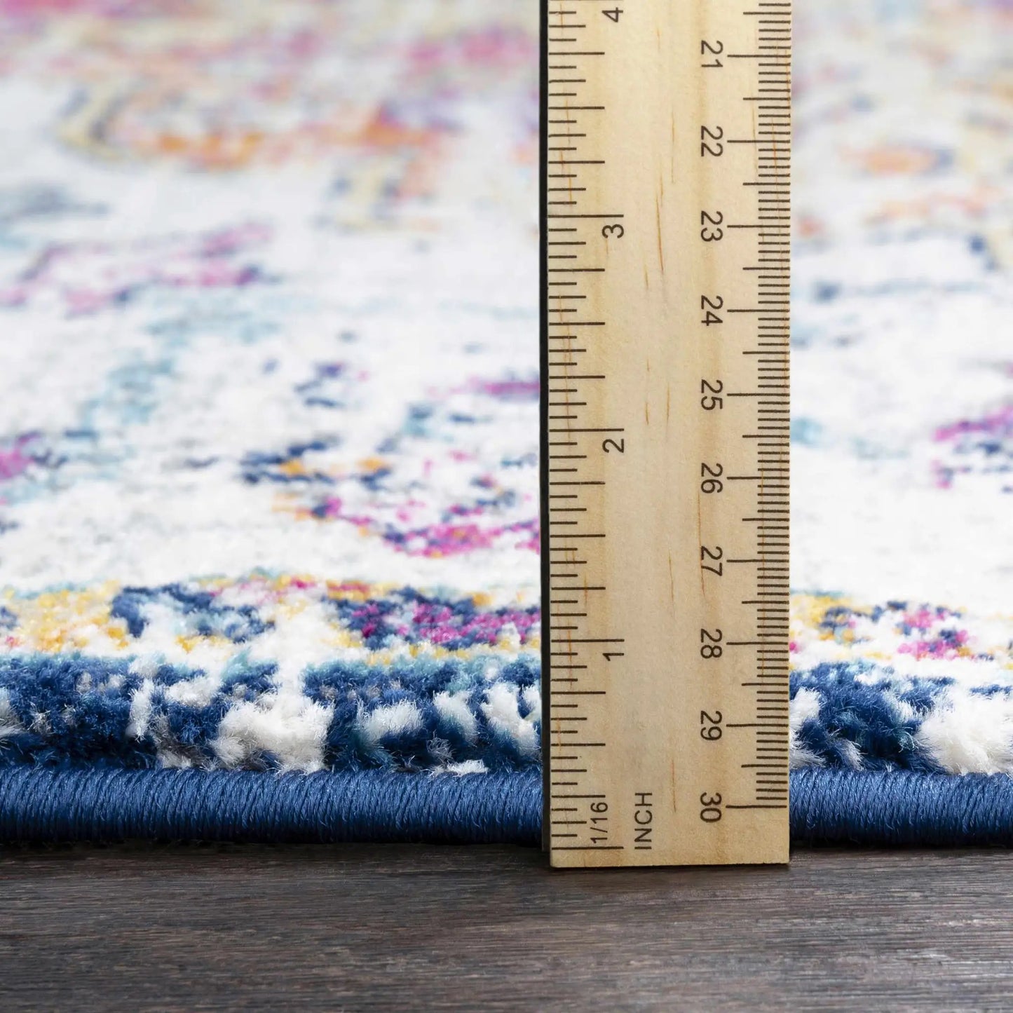 Bodrum Area Rug by Boutique Rugs, blue multicolor plush rug with pile and ruler visible, on Tampa Home & Garden Store